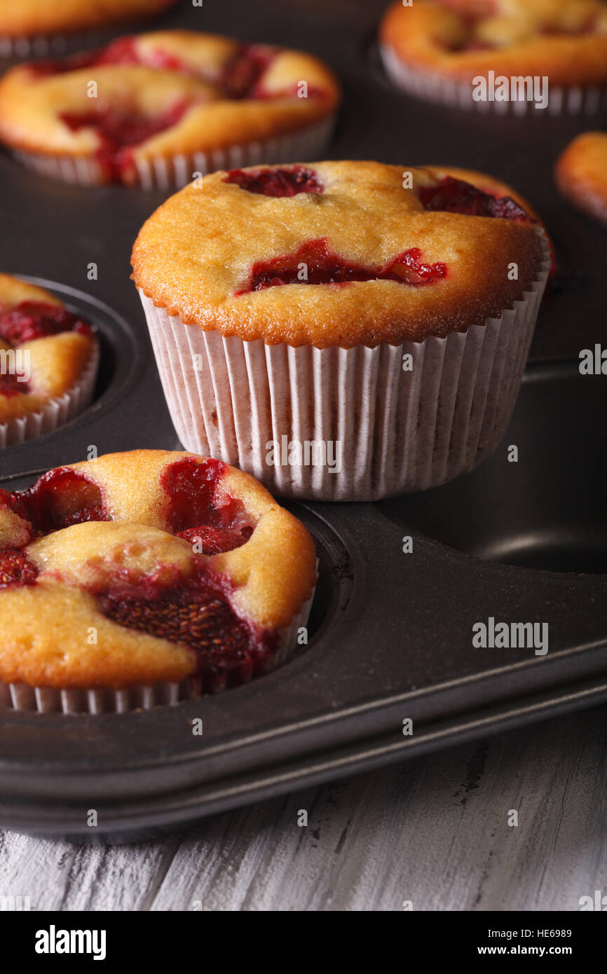 Woman baking chocolate cup cakes in glass tray in kitchen closeup. Young  girl put muffins in hot over. Female cooking tasty snack pastry at home.  Hea Stock Photo - Alamy