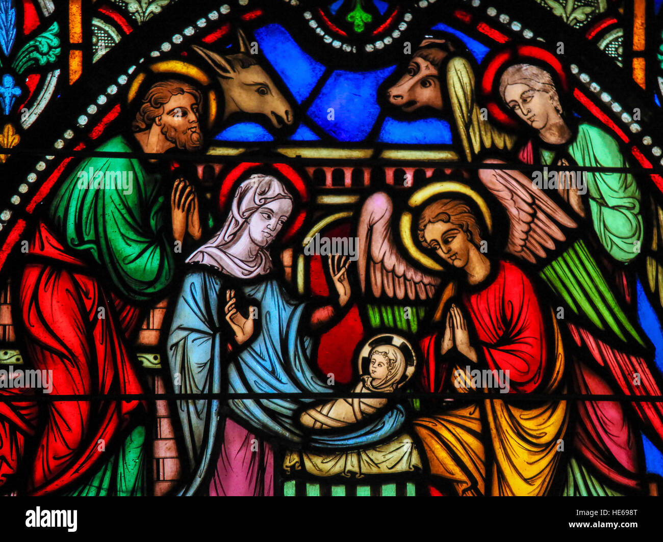 Stained glass window depicting Nativity Scene on Christmas in the