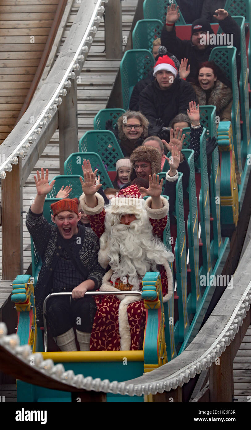 People dressed as Santa and elves rides the Scenic Railway at Dreamland ...