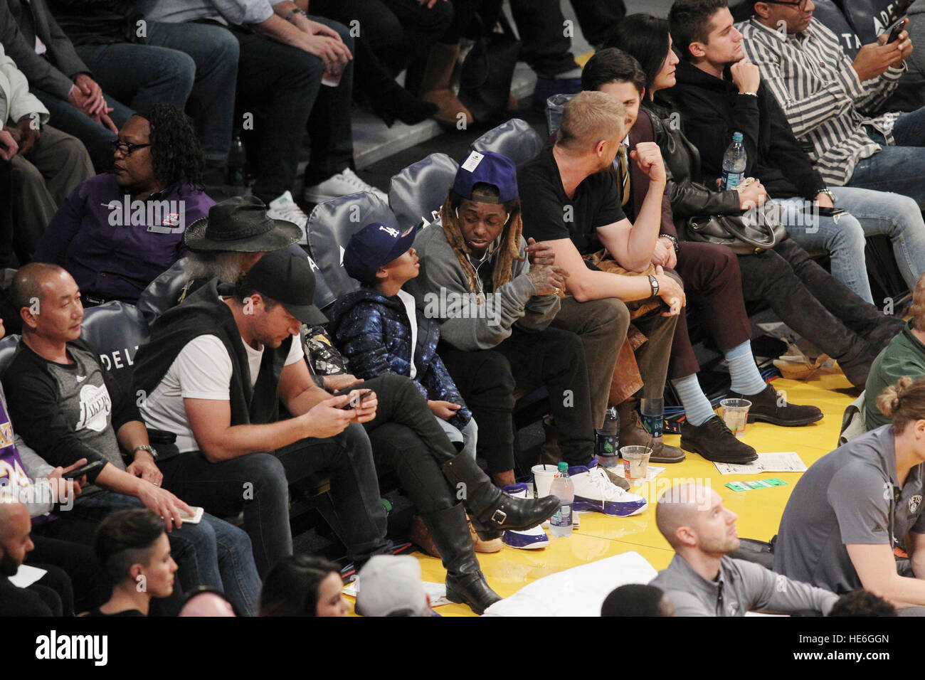 Lil Wayne at the Los Angeles Lakers game with his son. The Los Angeles  Lakers defeated the Brooklyn Nets by the final score of 125-118 at Staples  Center in downton Los Angeles.