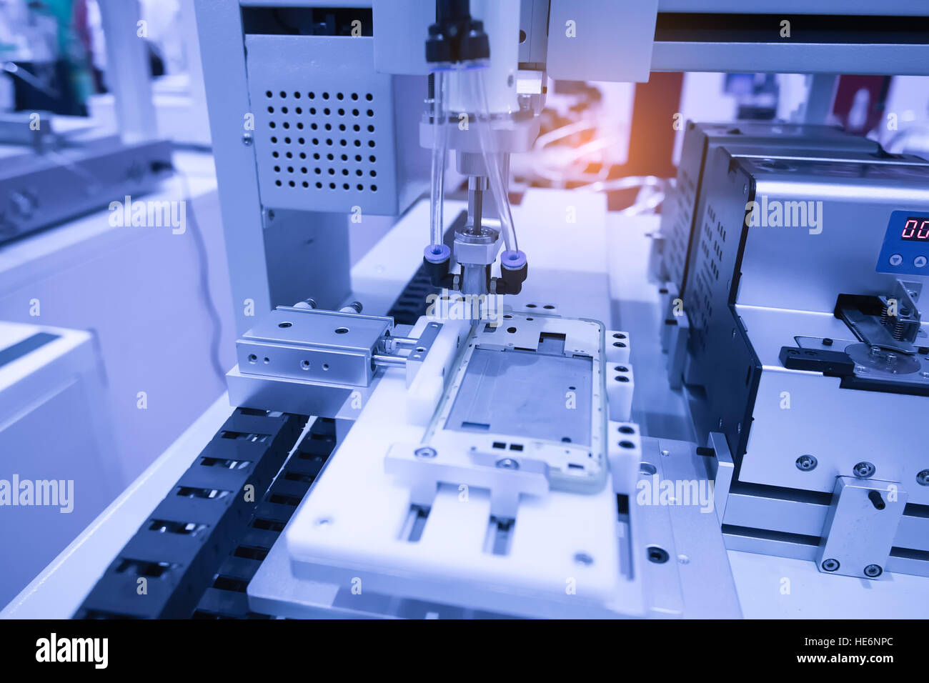 Robotic arm at production line in factory Stock Photo - Alamy