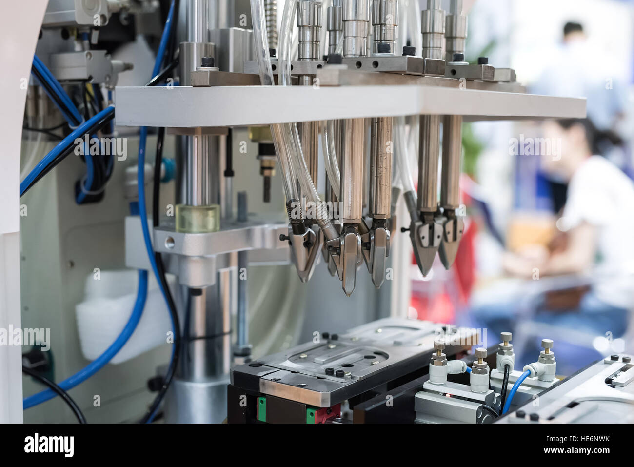 Robotic arm at production line in factory Stock Photo - Alamy
