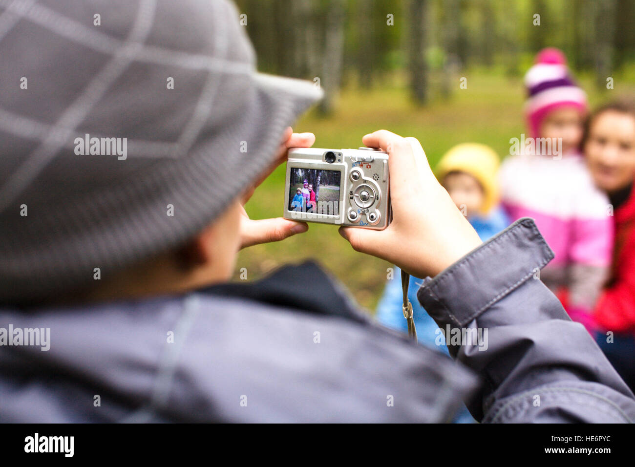 little offspring shooting his family in park outside, lifestyle people ...