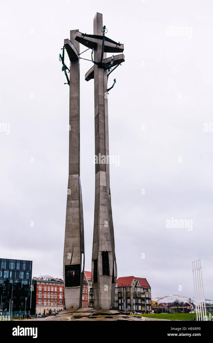 Three Crosses Memorial at the entrance to the Lenin Shipyard, Gdansk, in memory of workers killed by authorities during 1970 protests. Stock Photo