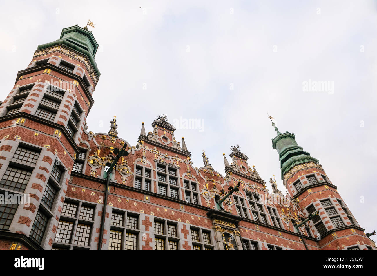 Great Armoury (Wielka Zbrojownia), Gdansk, with a fully restored pink facade with guilded detail. Stock Photo