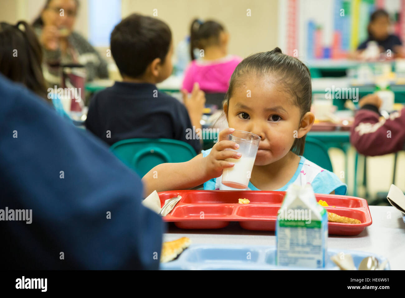 Thoreau, New Mexico - Students eat breakfast before school at St. Bonaventure Indian School, a Catholic school on the Navajo Nation. Stock Photo
