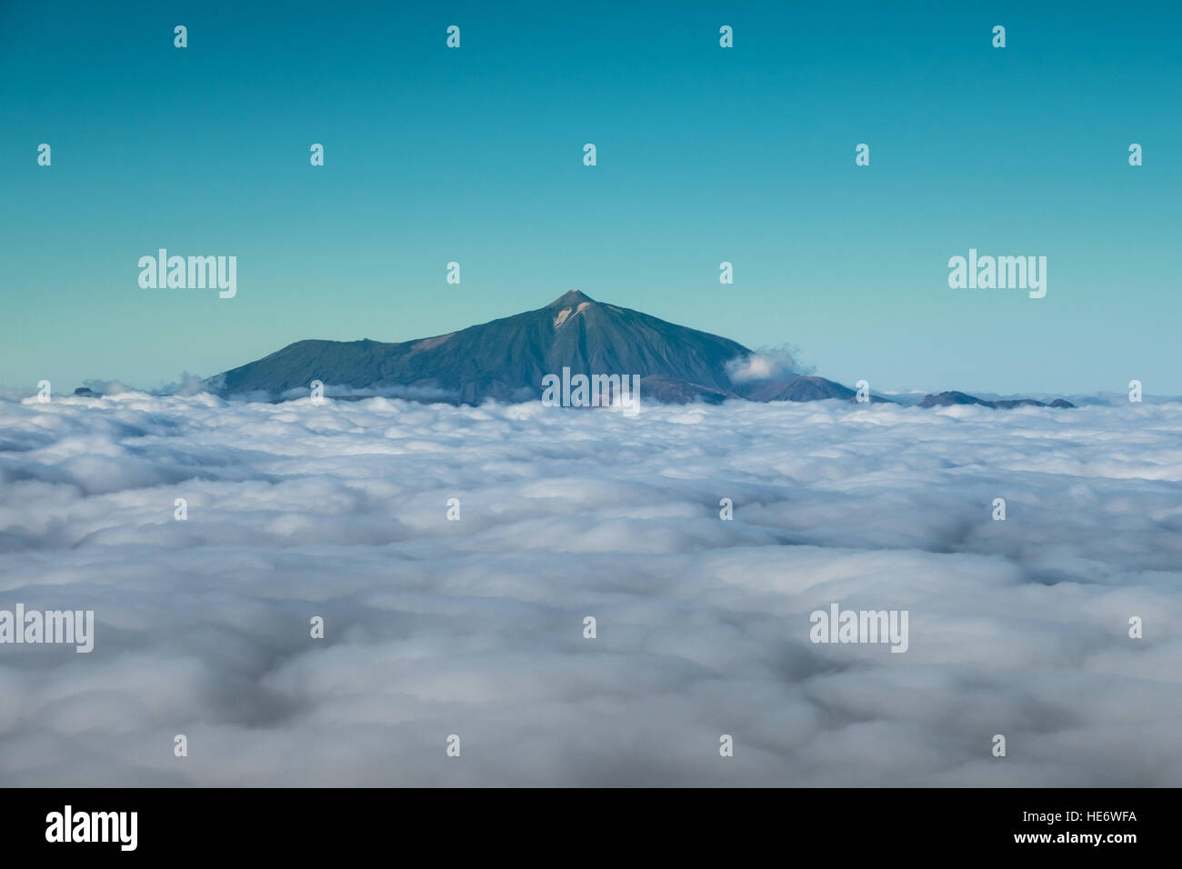 mountain summit above clouds, Pico del Teide, Tenerife Stock Photo