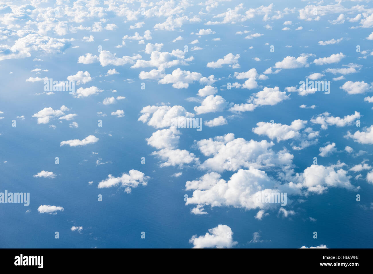 clouds above ocean, aerial shot above clouds Stock Photo