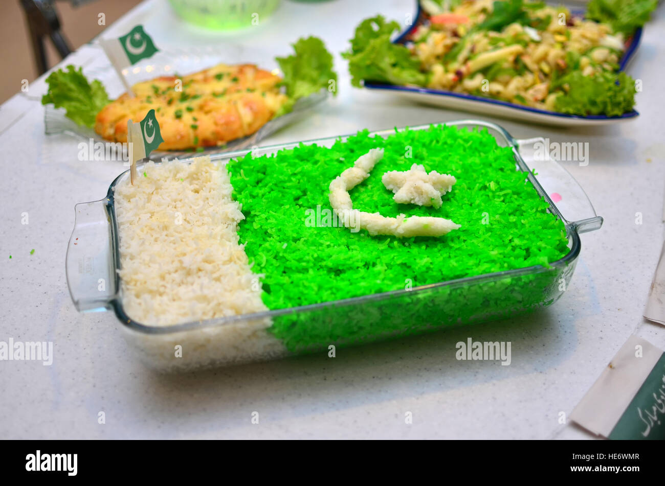 A tray of rice with Pakistan flag made with dye Stock Photo