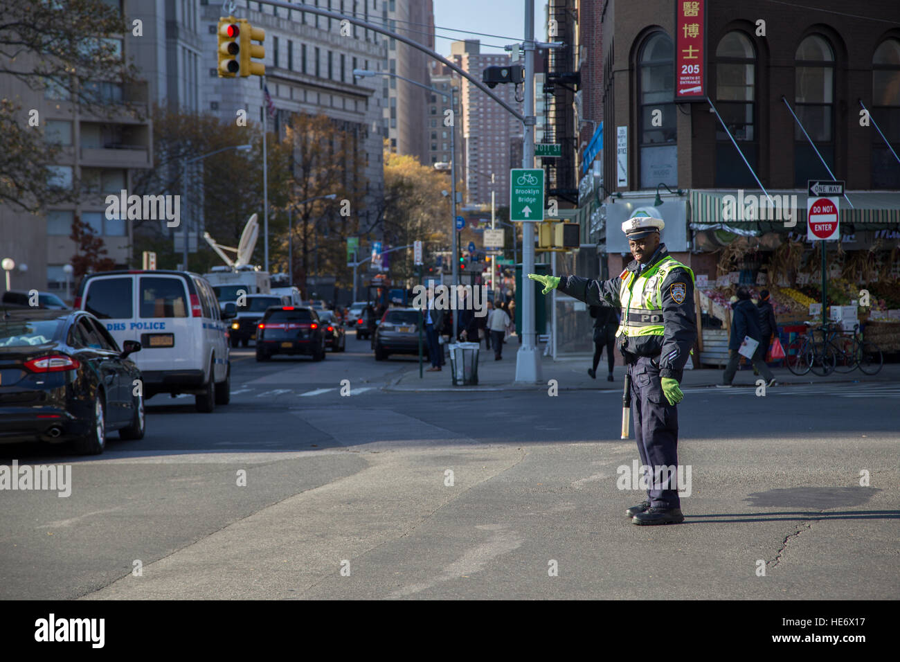 New York, United States of America - November 17, 2016: A black traffic cop regulating the traffic in Lower Manhattan district Stock Photo