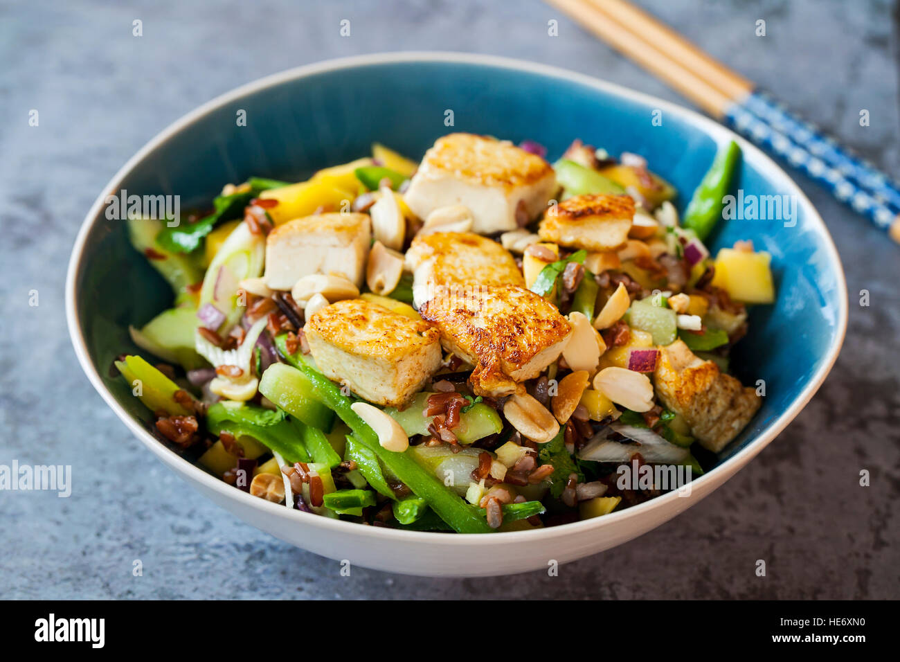 Vegan salad with tofu Stock Photo - Alamy