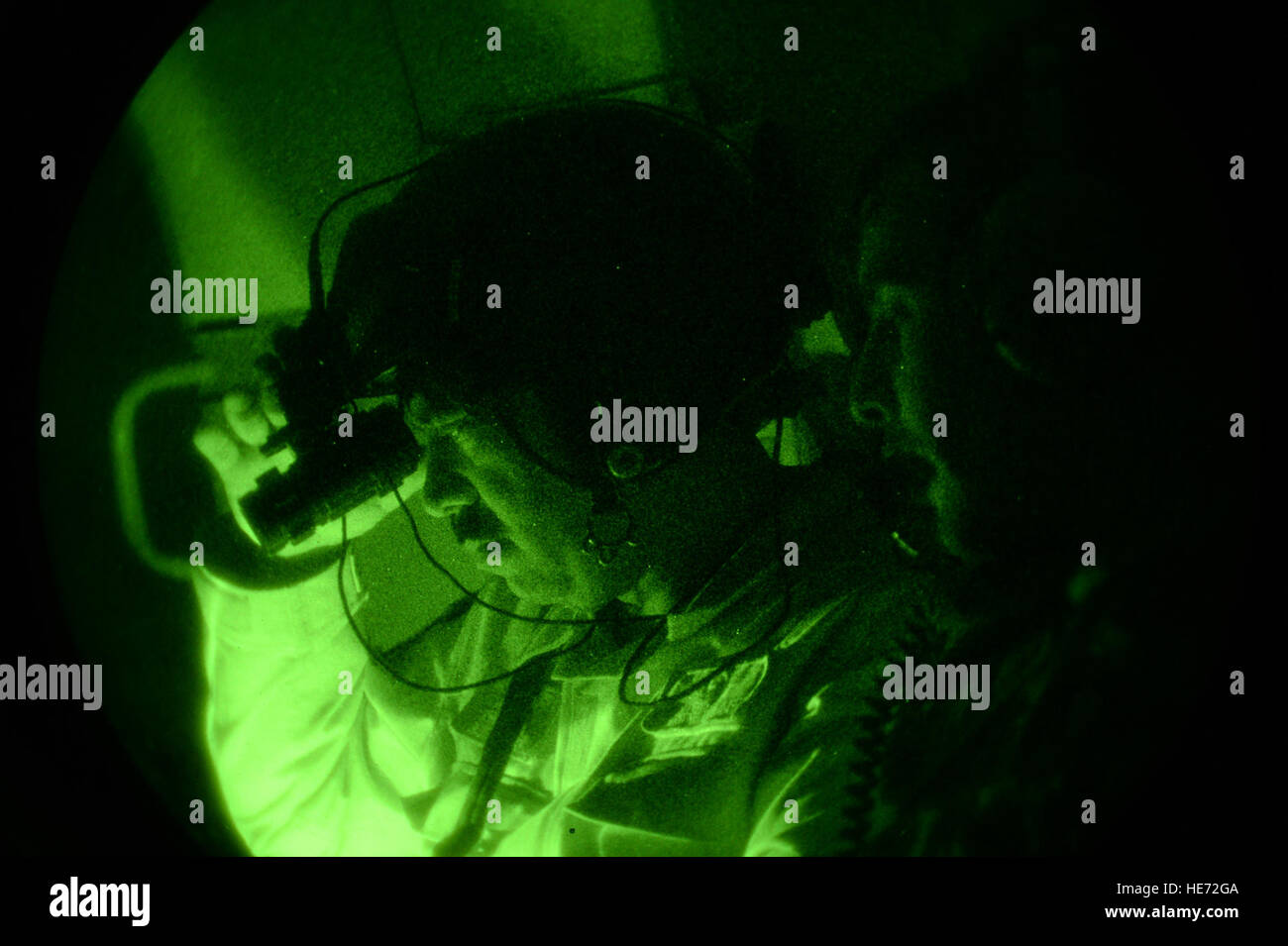 An Afghan air force aircrew member trains on night vision googles