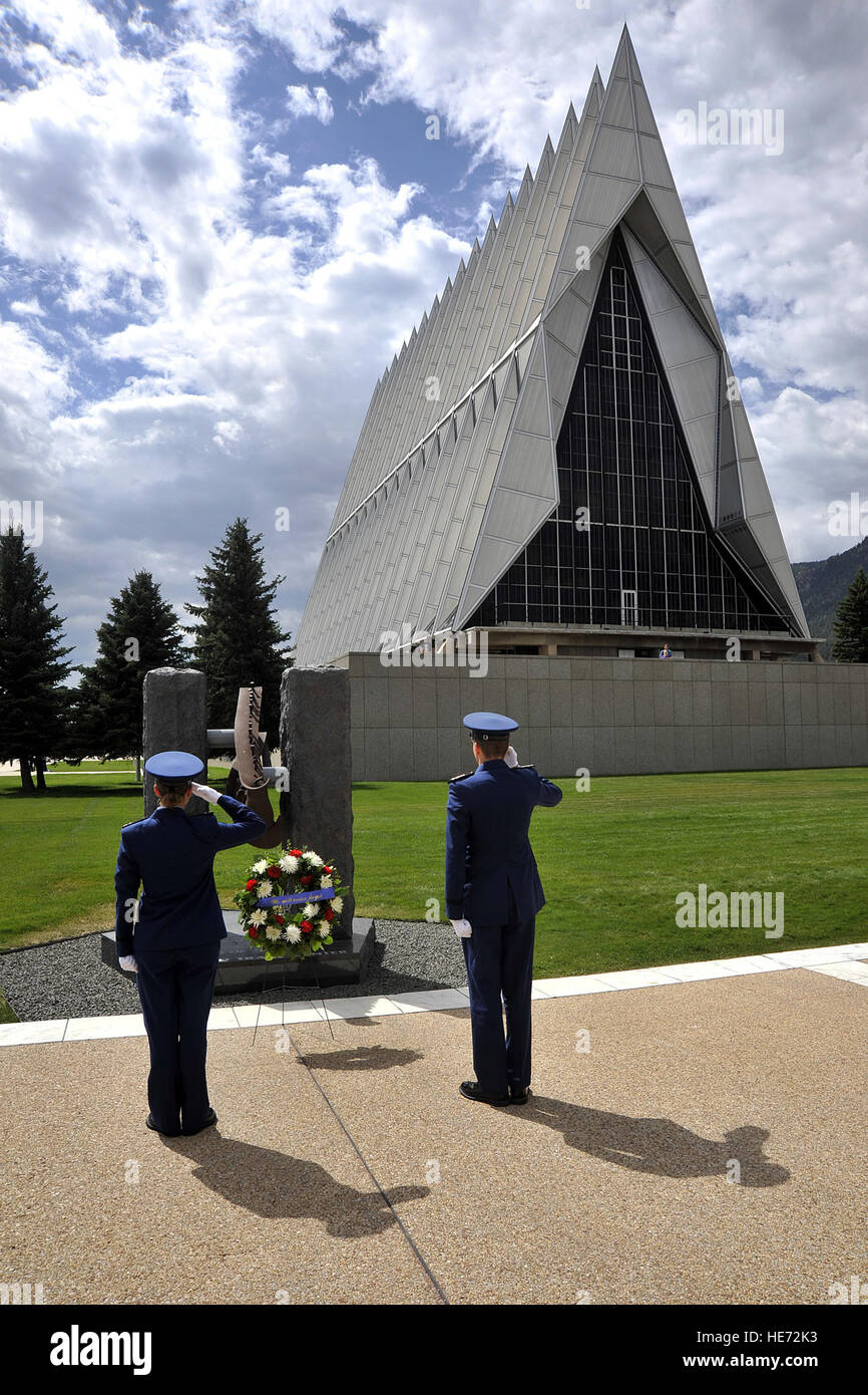 U.S. Air Force Academy Cadet 1st Class Austin Nash, left, and Cadet 3rd Class Alexandra Lingle salute during a ceremony marking the anniversary of the Sept. 11, 2001, terrorist attacks on the United States at the Air Force Academy in Colorado Springs, Colo., Sept 11, 2012. Terrorists hijacked four passenger aircraft Sept. 11, 2001. Two of the aircraft were deliberately crashed into the World Trade Center in New York; one was crashed into the Pentagon; the fourth crashed near Shanksville, Pa. Nearly 3,000 people died in the attacks.  Raymond McCoy, U.S. Air Force Stock Photo