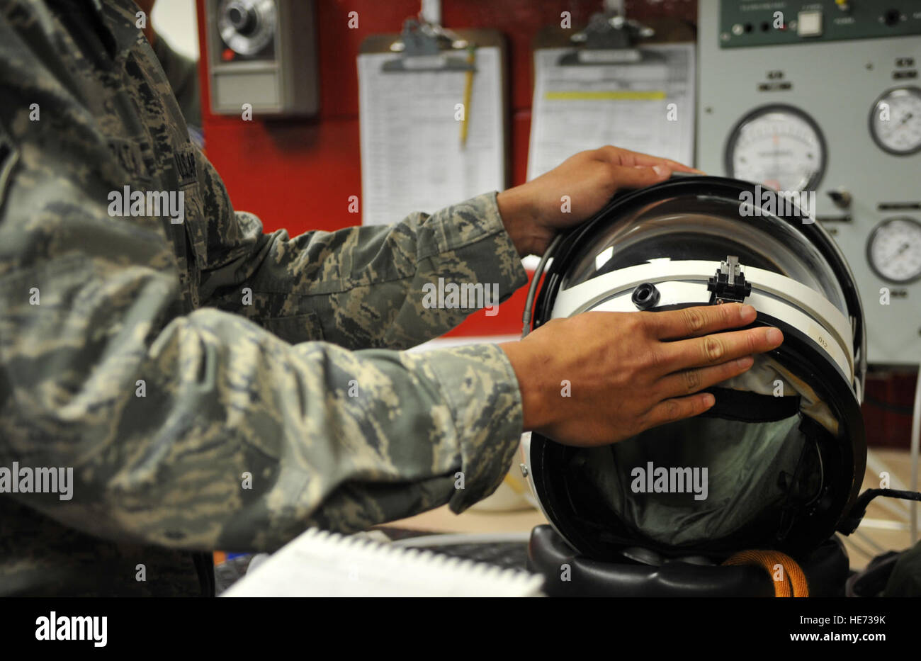 Decompression In Flight A U-2 Dragon Lady pilot helmet seal is demonstrated during an immersion ...