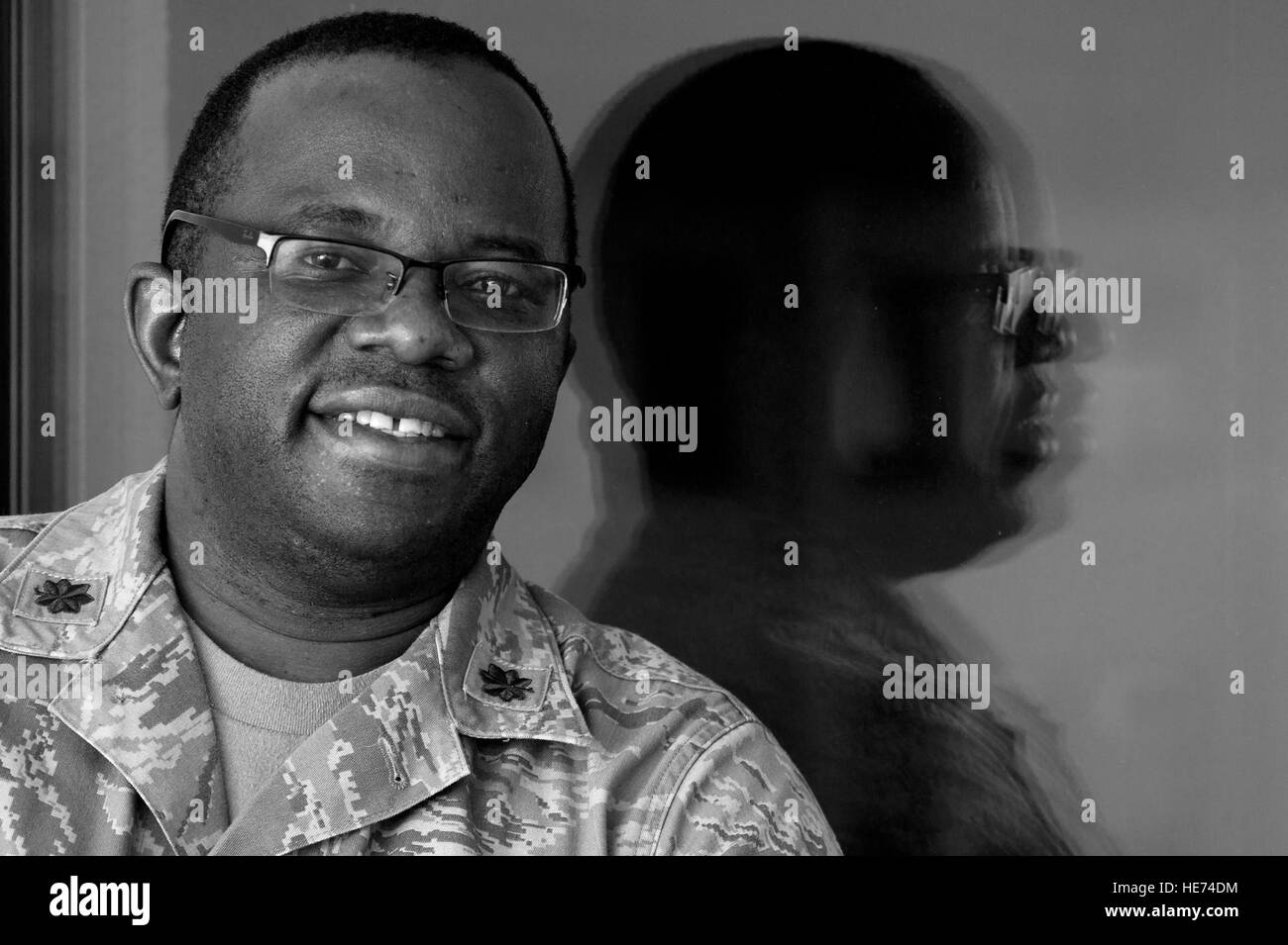 Maj. Francis Obuseh, U.S. Air Forces in Europe and Air Forces Africa Surgeon General’s Office epidemiologist and international health specialist, poses for a photo Nov. 13, 2014 weeks after returning from Monrovia, Liberia. Obuseh was sent to Liberia to conduct a site survey for a field hospital to be used in the fight against the epidemic Ebola outbreak there. Tech. Sgt. Benjamin Wilson) Stock Photo