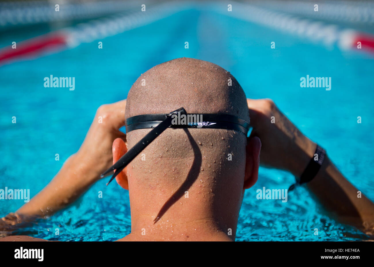 Senior Airman Francisco Perez Castillo, 96th Maintenance Group, adjusts his goggles before beginning a lap swim training session March 22 at Eglin Air Force Base, Fla.  The 26-year-old Airman was recently inducted into the Pontifical Catholic University of Puerto Rico Sports Hall of Fame.  Samuel King Jr.) Stock Photo