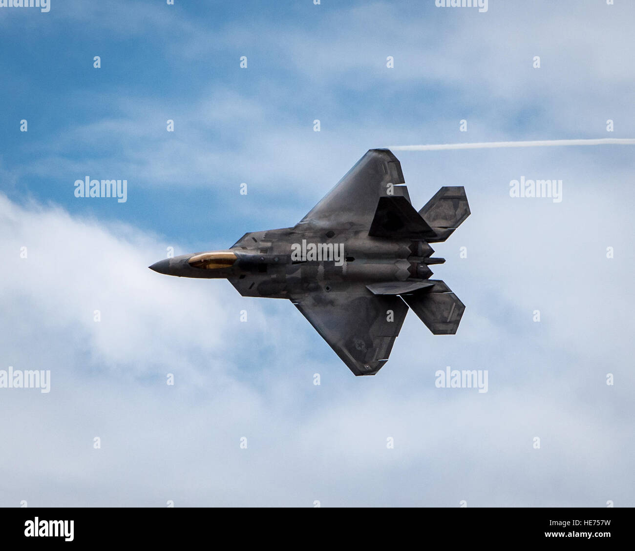 An F-22 Raptor demonstrates its maneuverability during the Wings Over ...