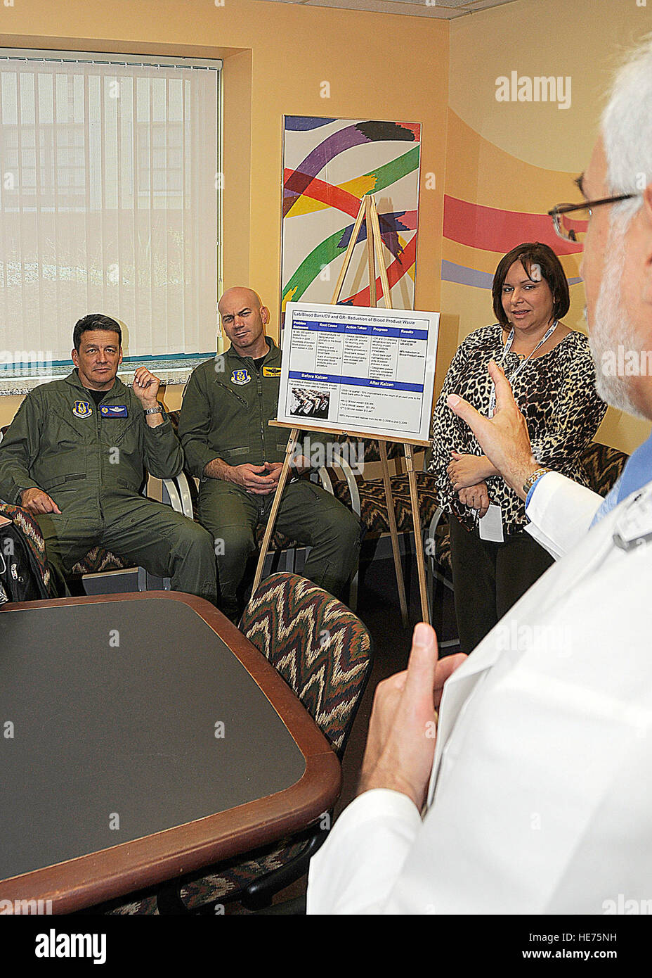 Dr. Steven J. Melnick, chief Department of Pathology and Clinical  Laboratories at the Miami Children's Hospital, addresses Maj. Gen. Frank J.  Padilla, 10th Air Force commander, during a tour focused on the