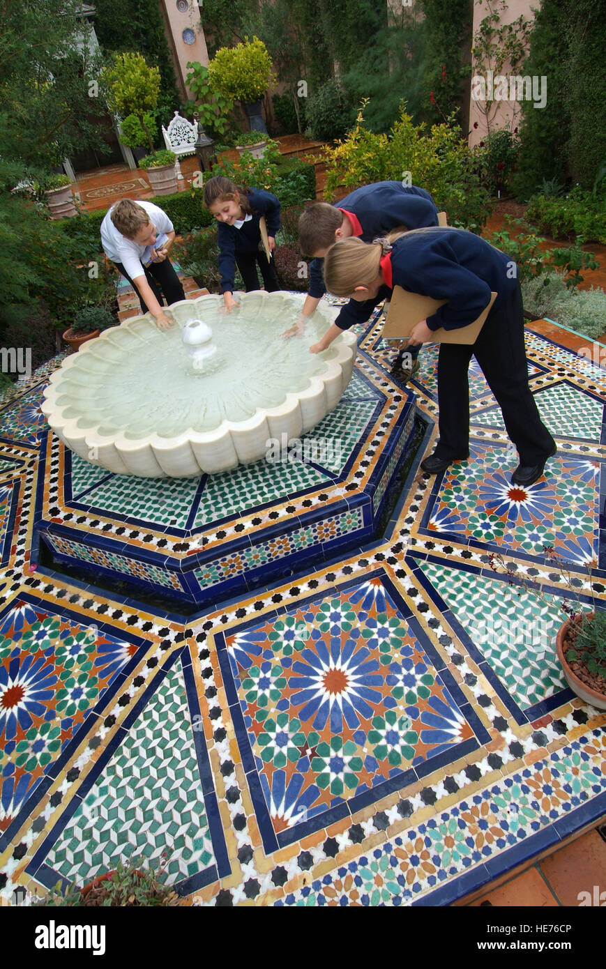 Schoolchildren visiting the Islamic Garden at Highgrove House, which was created by HRH The Prince of Wales. Stock Photo