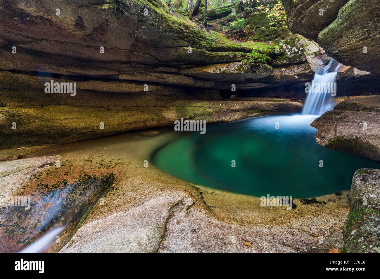 Sabbaday Falls plunges into a glassy pool, White Mountain National Forest, NH Stock Photo
