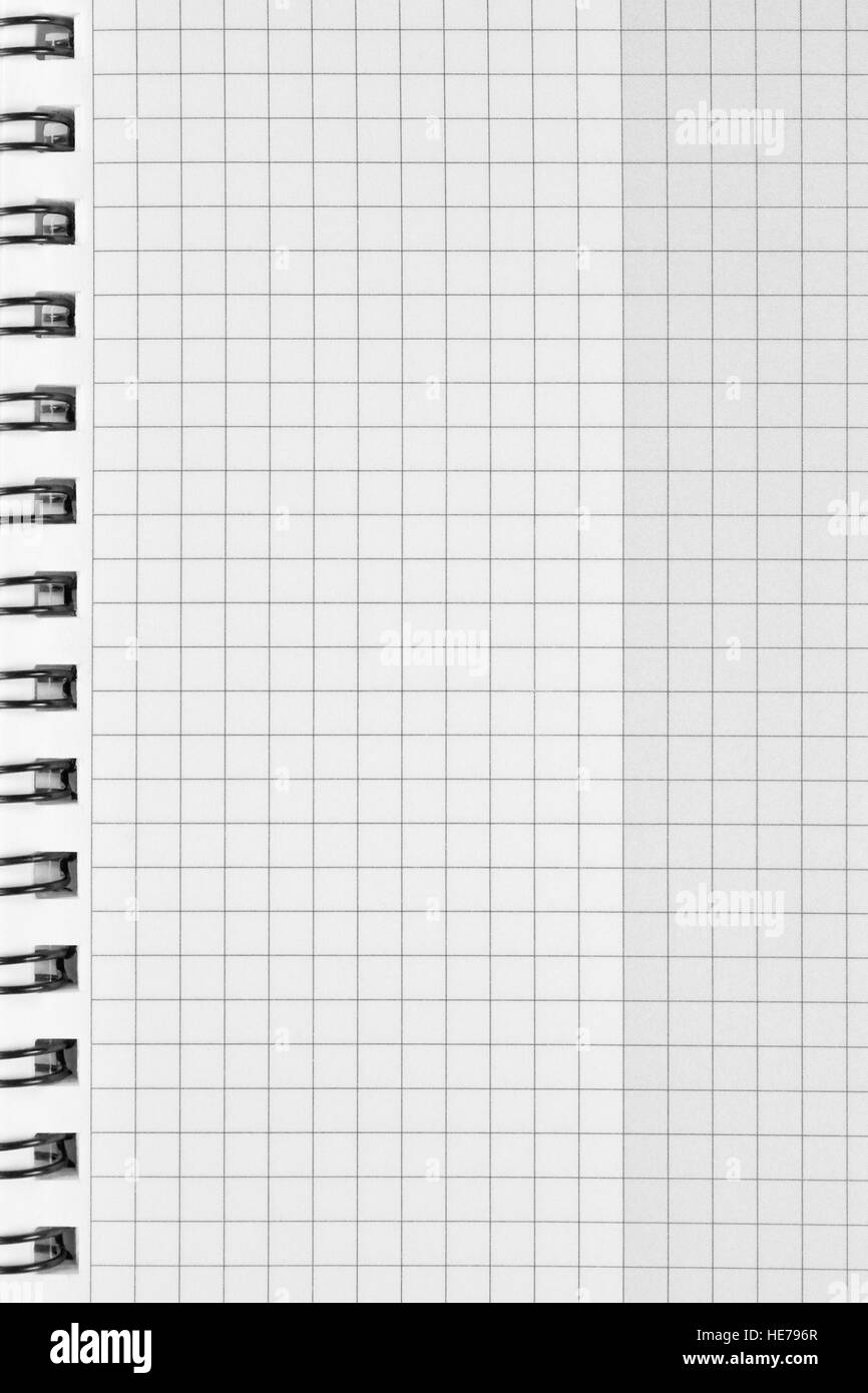 Checked spiral notebook background pattern, vertical chequered squared open notepad copy space, stapled blank empty blocknote, reminder concept Stock Photo