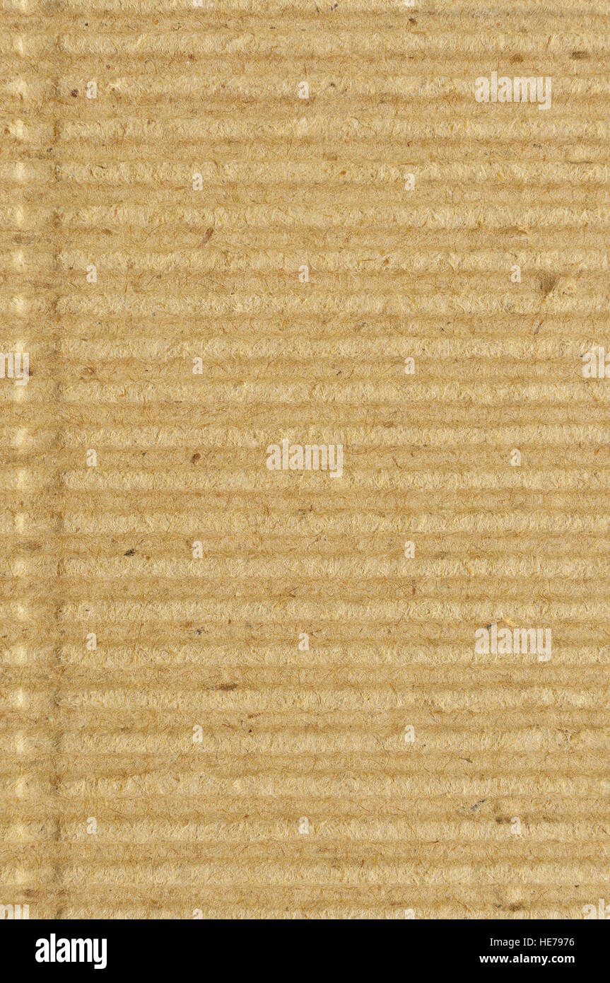 Corrugated cardboard goffer paper texture, bright rough old recycled goffered crimped textured blank empty grunge copy space background, large aged Stock Photo