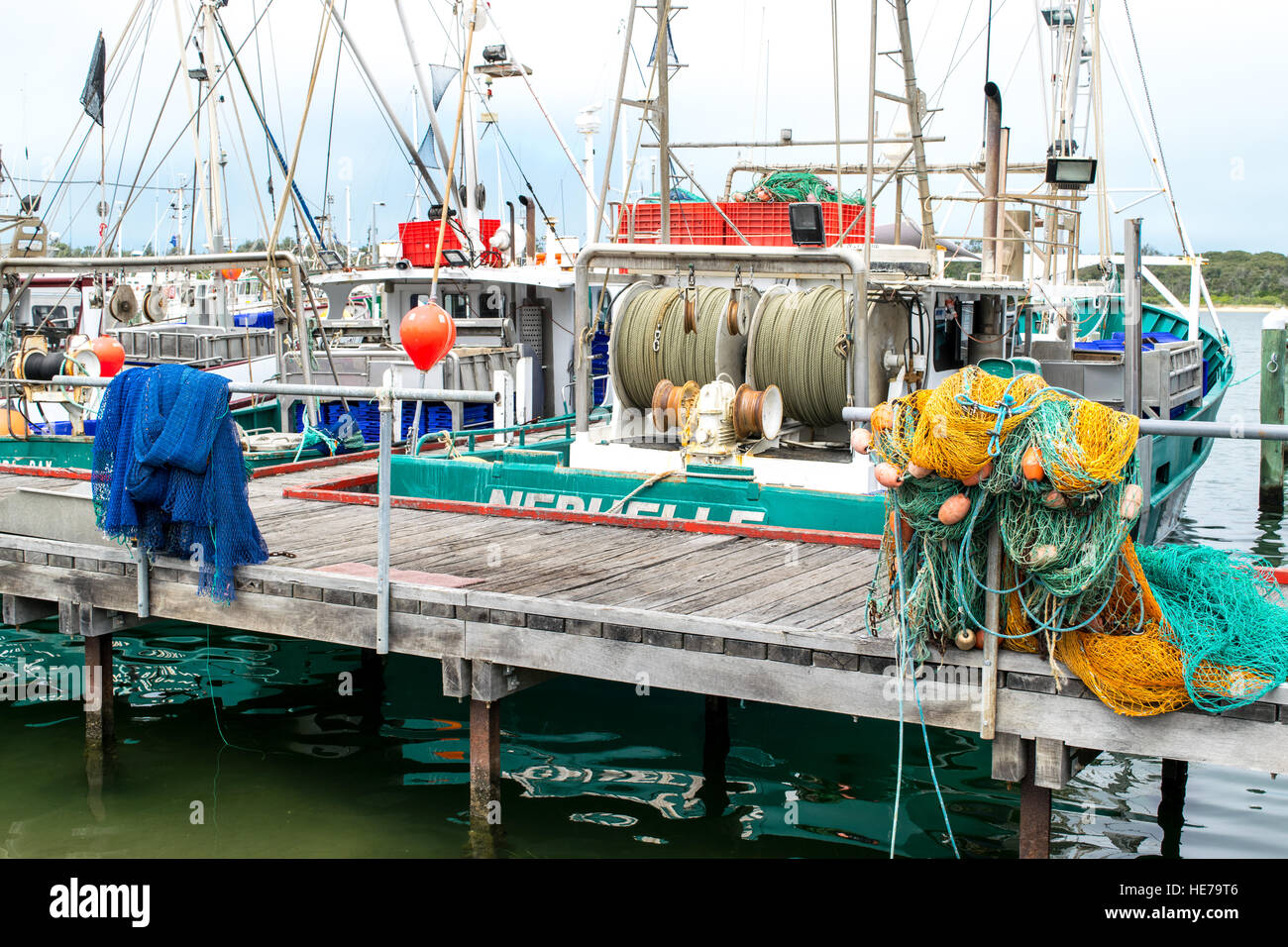 Commercial fishing boats at rest in the harbour at Lakes Entrance in