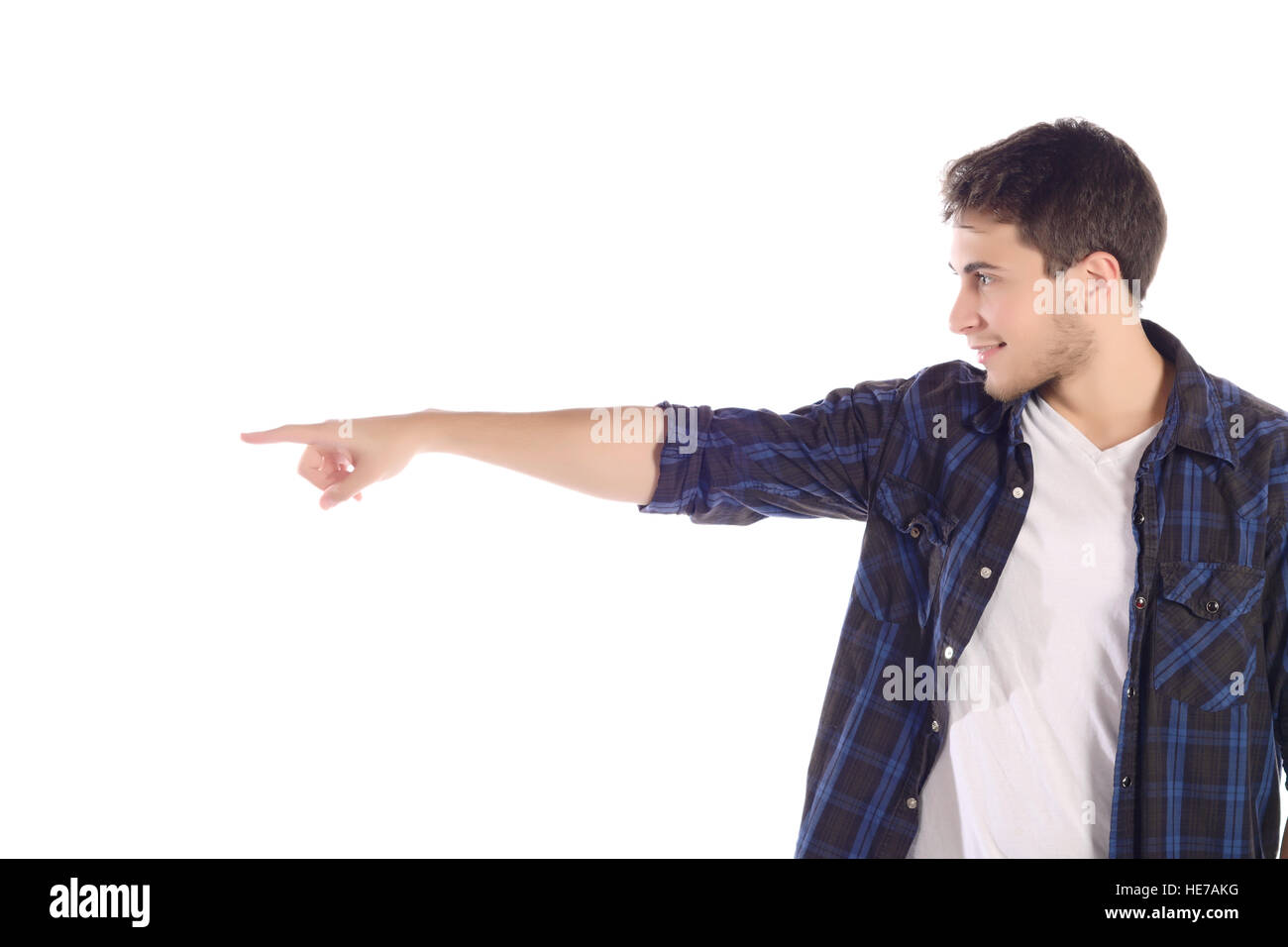 Portrait Of A Young Handsome Man Pointing At Something Isolated White portrait-of-a-young-handsome-man-pointing-at-something-isolated-white