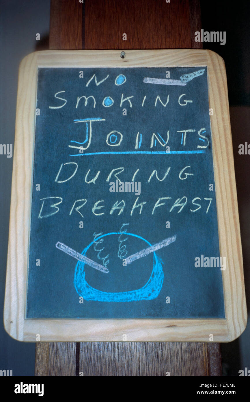 hand drawn blackboard sign in hotel stating no smoking joints during breakfast amsterdam holland Stock Photo