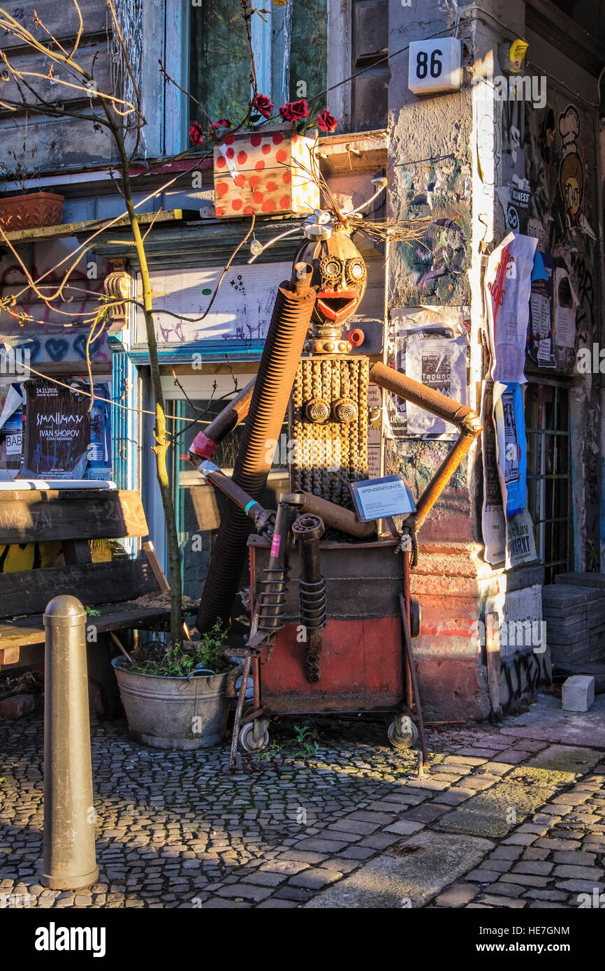 Berlin Kastanienallee 86, alternative housing project, Sculpture of scrap metal & materials outside old historic building.  . Stock Photo