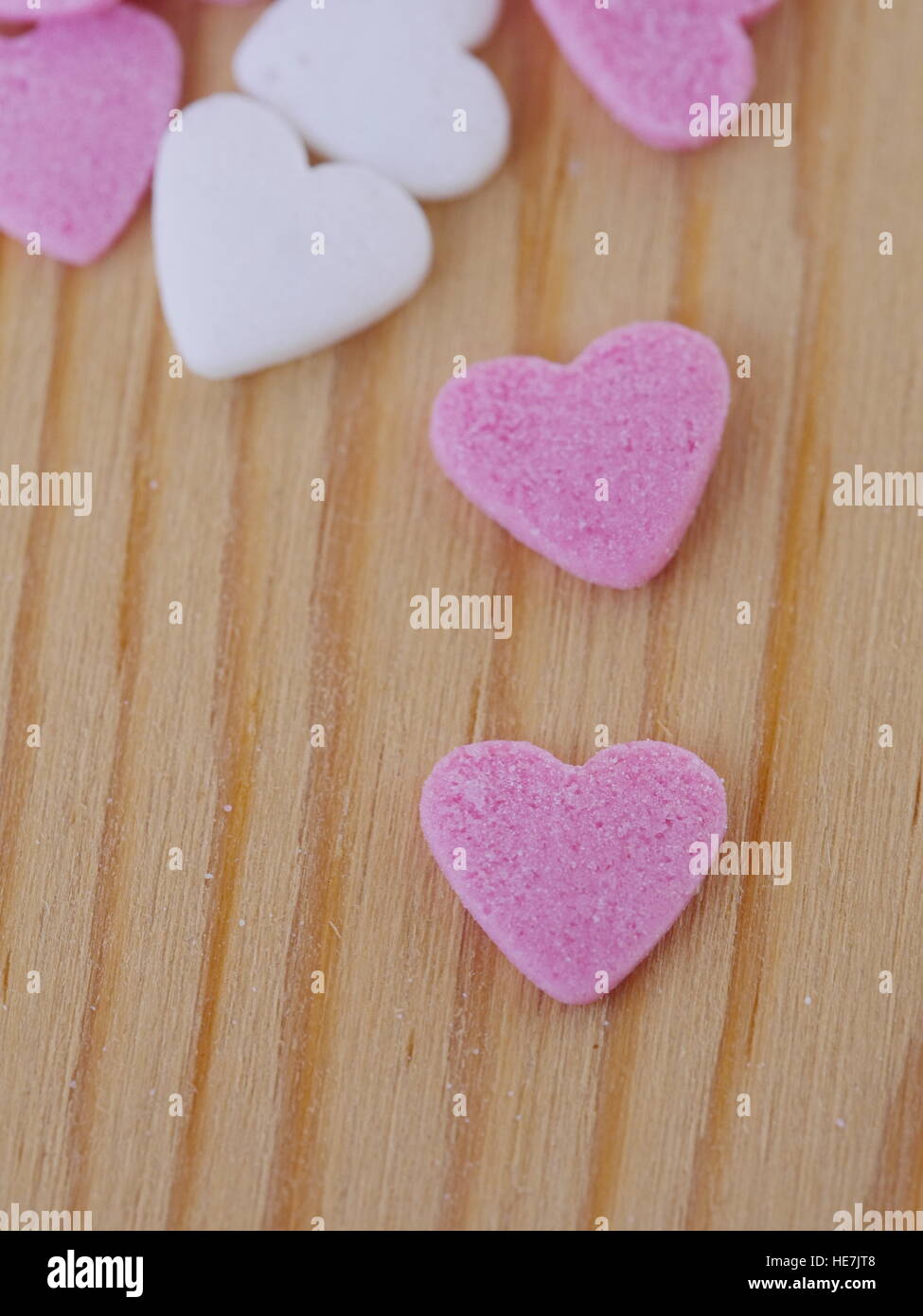 candy hearts wood background Stock Photo
