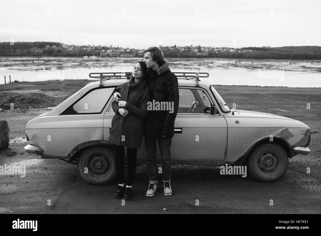 young beautiful couple on the ice of a frozen lake Stock Photo Alamy