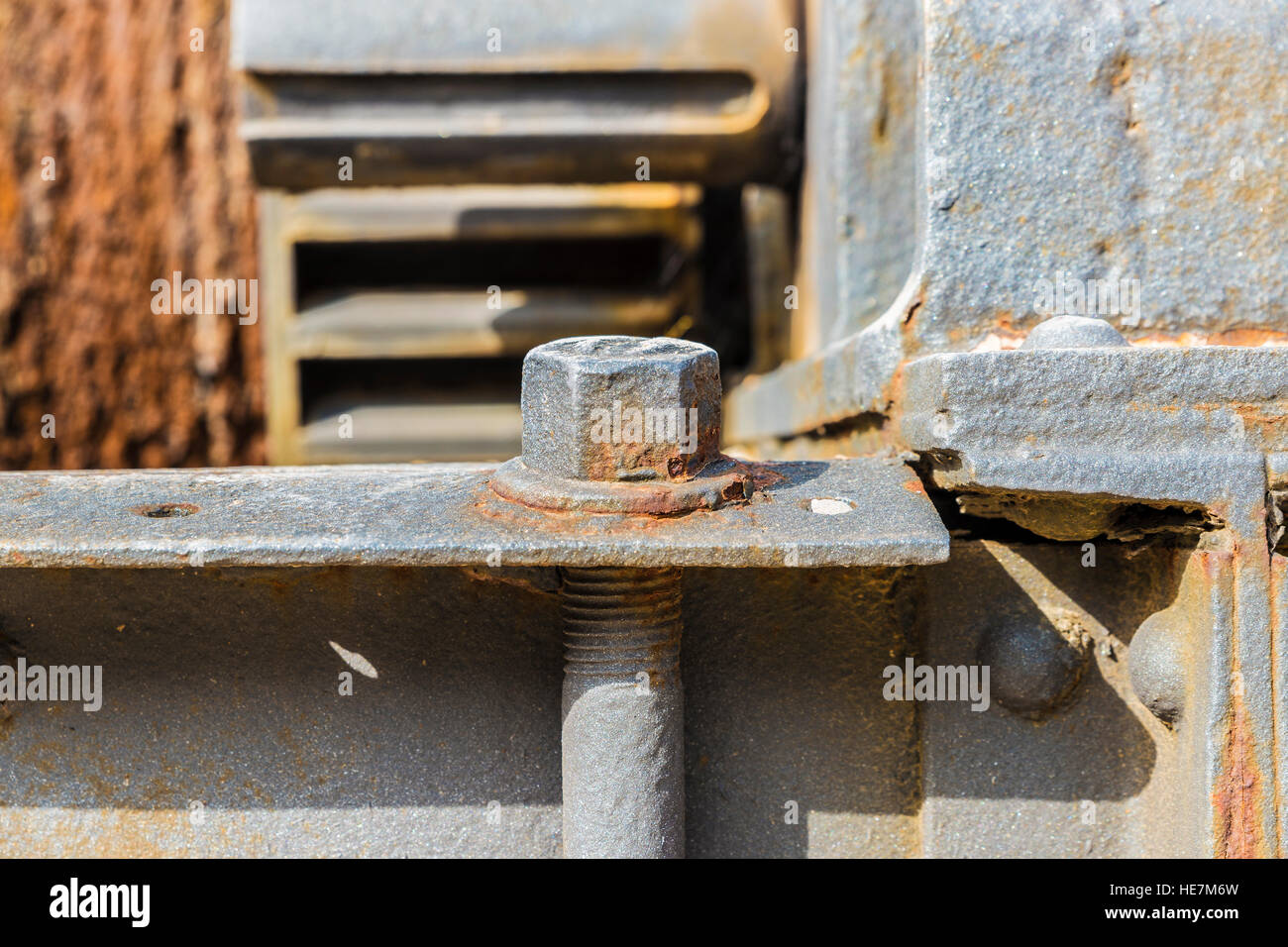 Old rusty screw from a machine Stock Photo - Alamy