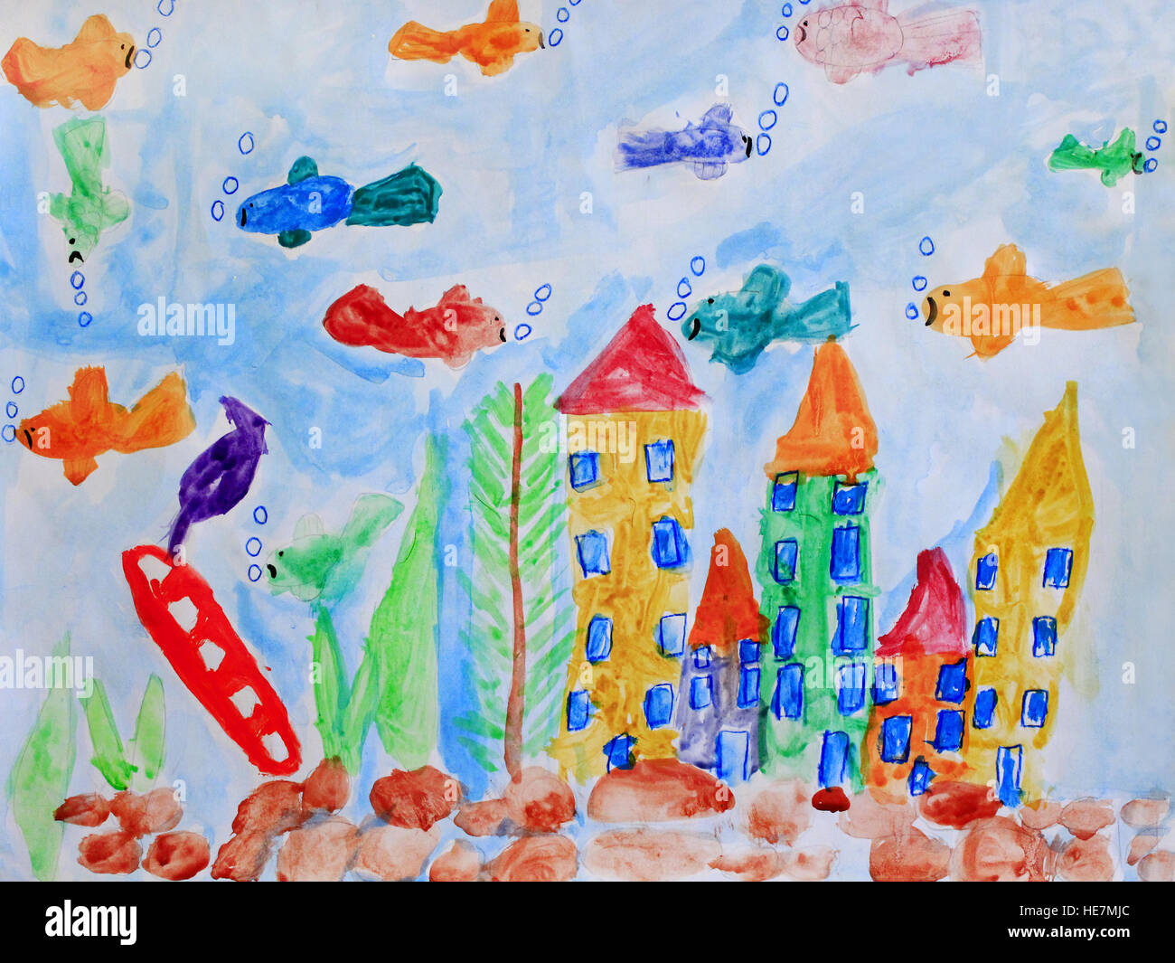 Multicolored child's drawing with fishes and underwater castles in the aquarium Stock Photo