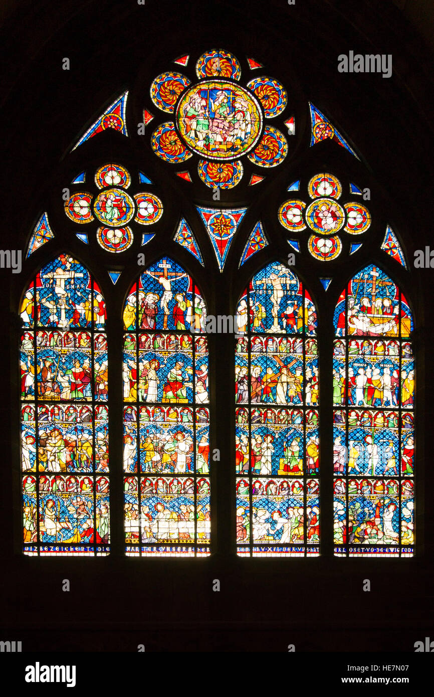 A stained glass window in Strasbourg cathedral depicting the death of the  virgin and The Passion Stock Photo - Alamy