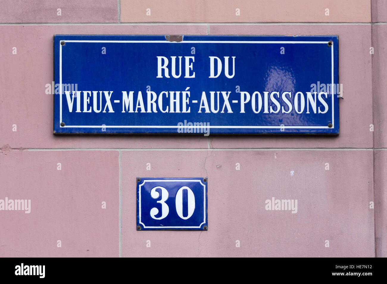 A street sign for Rue Du Vieux-Marché-Aux-Poissons Stock Photo