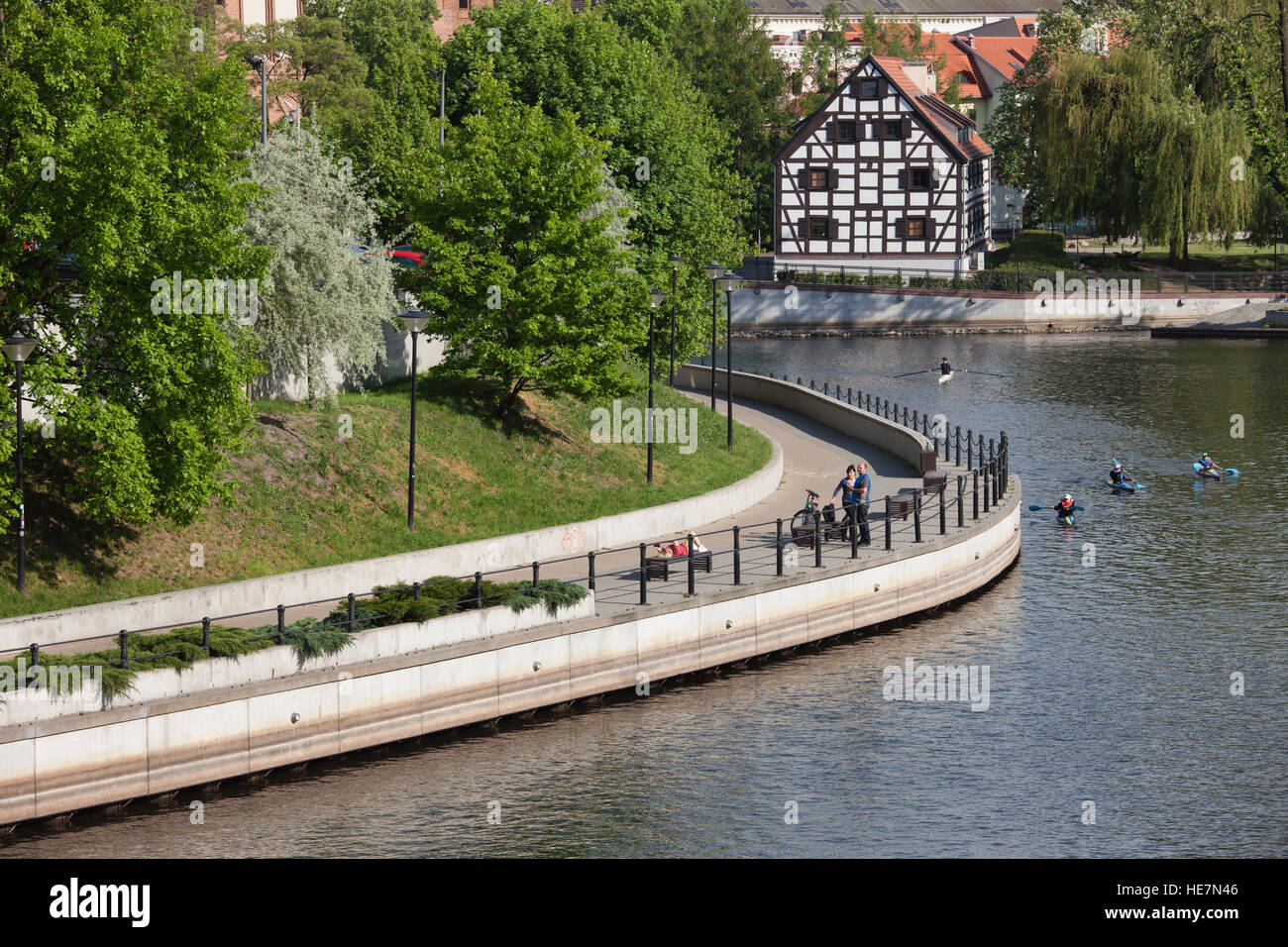 White Granary and Brda River promenade in city of Bydgoszcz, Poland Stock Photo