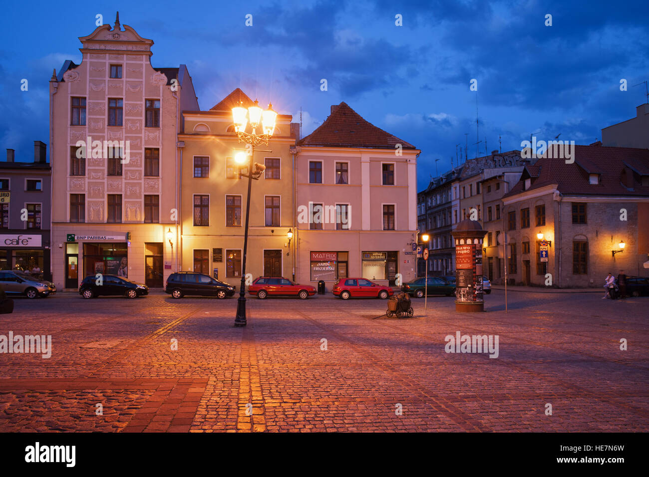 New Town Square (Rynek Nowomiejski) historic houses at dusk in city of Torun, Poland Stock Photo
