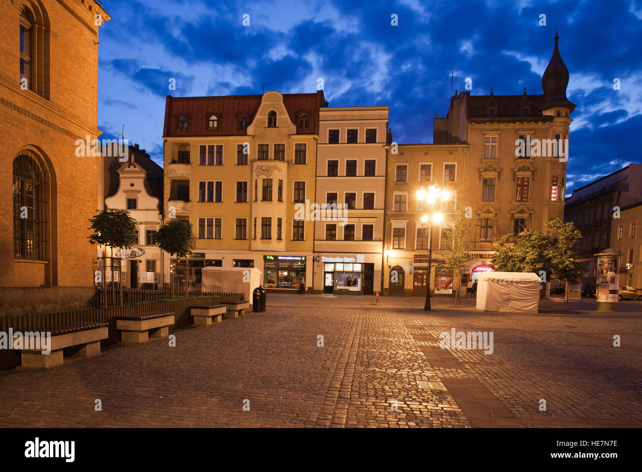 Old houses at New Town Square by night in city of Torun, Poland Stock Photo