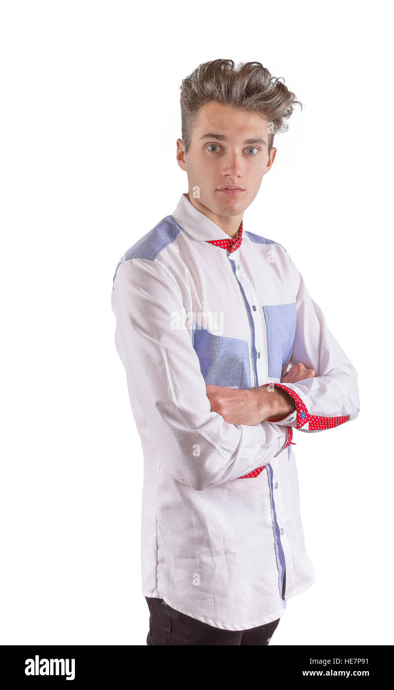 Stylish man dressed in a blue and white formal shirt with red polkadot sleeve detail Stock Photo