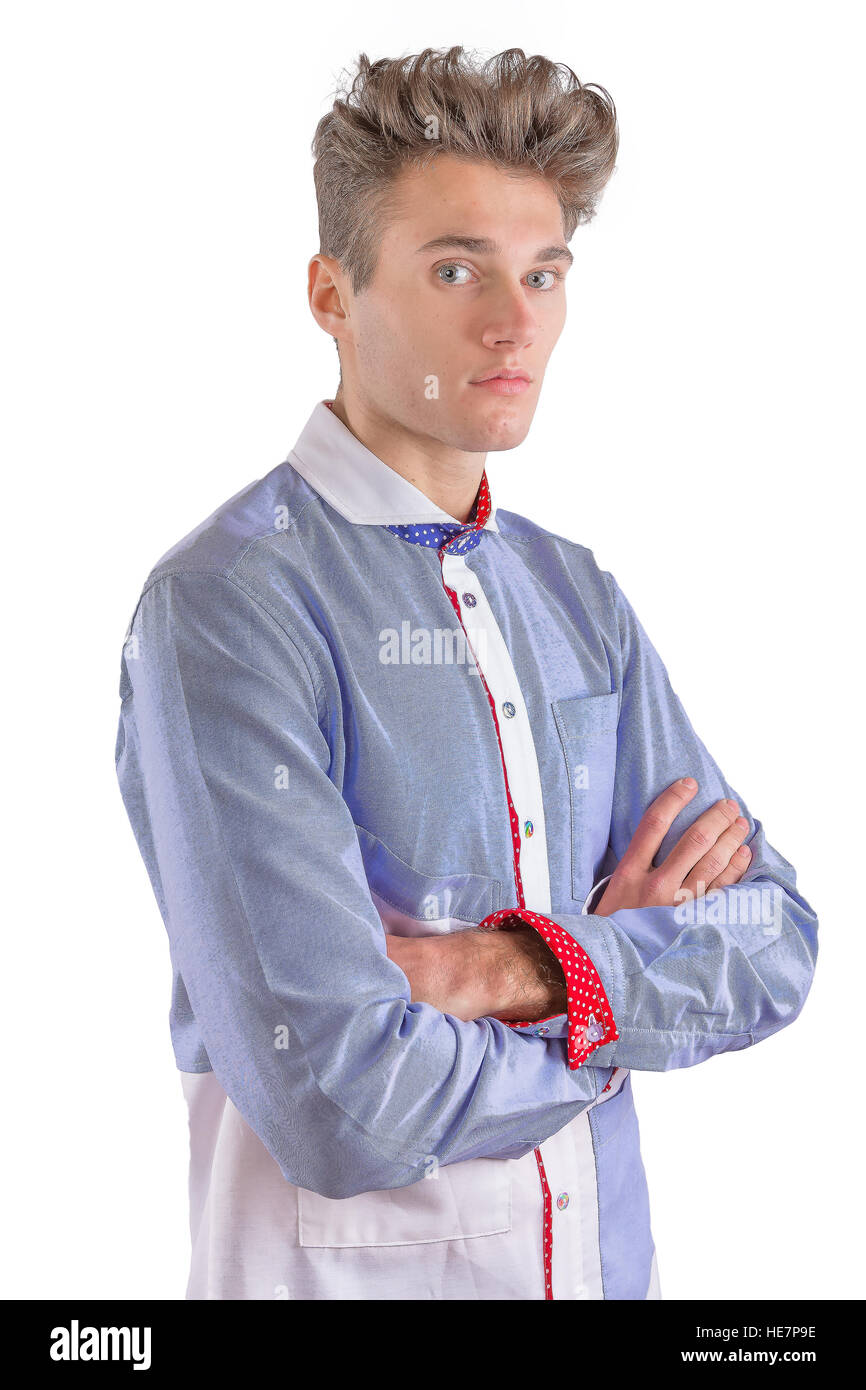 Stylish man dressed in a blue and white formal shirt, with blue and white polkadot detailing on penny collar and sleeves Stock Photo