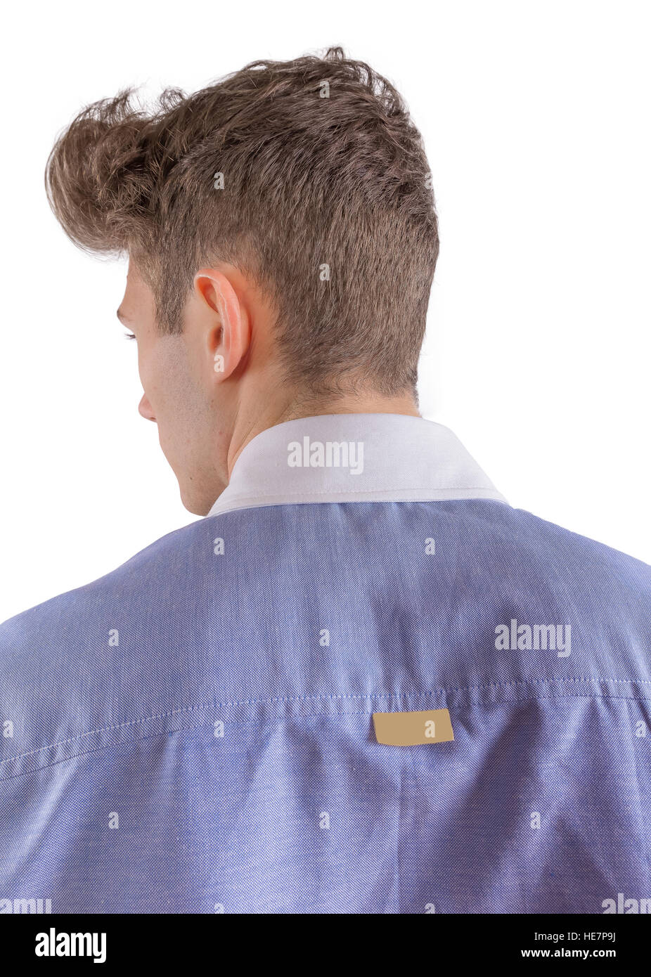Young blond stylish man dressed in a blue formal shirt, close-up of back Stock Photo