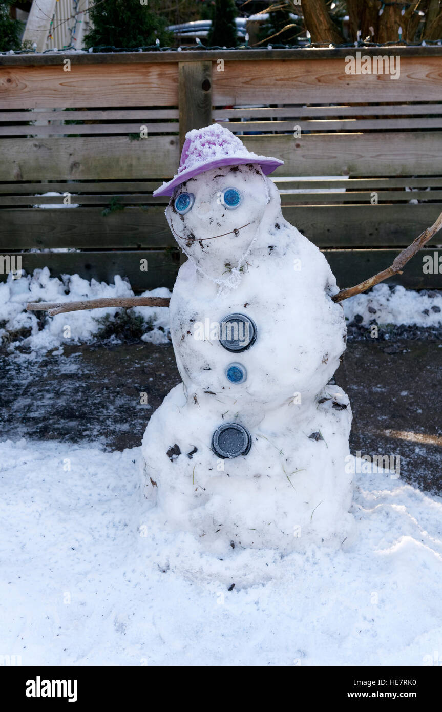 A snowman with stick arms, Vancouver, British Columbia, Canada Stock Photo