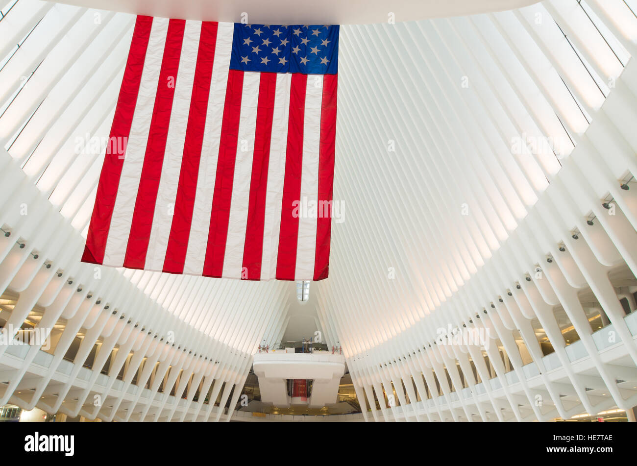 NEW YORK - APRIL 27, 2016: American flag in the Oculus station building in Manhattan. It is the most expensive station in the world Stock Photo