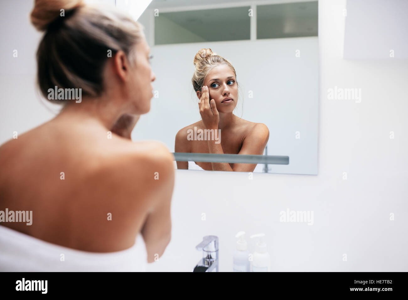 Woman cream applying face hi-res stock photography and images - Alamy
