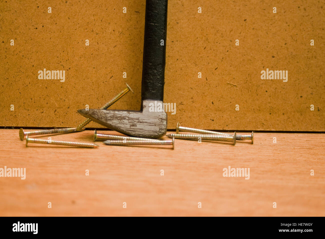 Nail removing hand tool with nails. Stock Photo