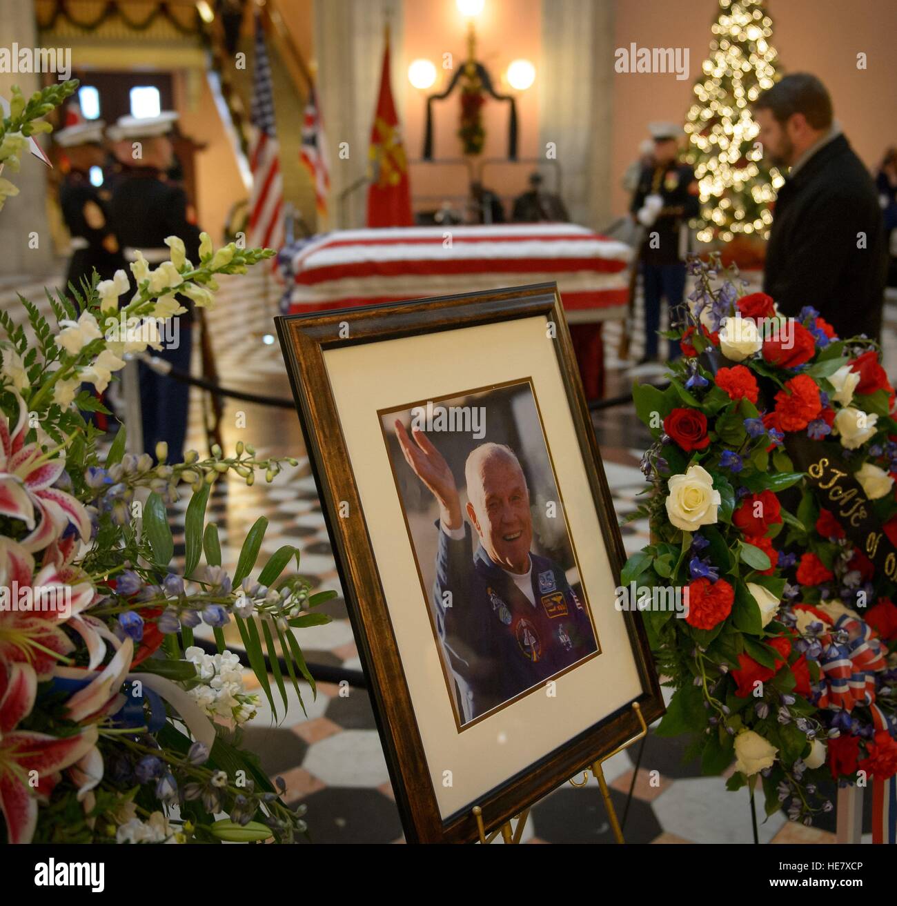 Members of the public pay their respects to astronaut and former Senator John Glenn in repose at the Ohio Statehouse December 16, 2016 in Columbus, Ohio. The former Marine pilot, Senator and first man to orbit the earth died last week at the age of 95. Stock Photo