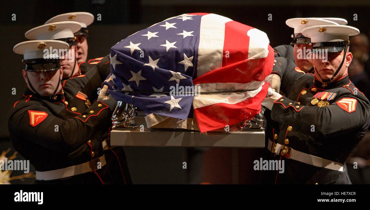 U.S. Marines pallbearers bring carry casket of astronaut and former Senator John Glenn during a memorial service at Ohio State University December 17, 2016 in Columbus, Ohio. The former Marine pilot, Senator and first man to orbit the earth died last week at the age of 95. Stock Photo