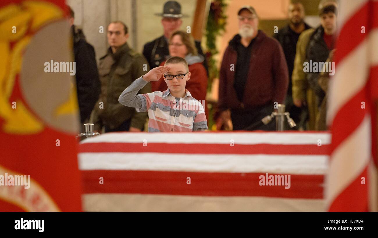 Members of the public pay their respects to astronaut and former Senator John Glenn in repose at the Ohio Statehouse December 16, 2016 lying in Columbus, Ohio. The former Marine pilot, Senator and first man to orbit the earth died last week at the age of 95. Stock Photo
