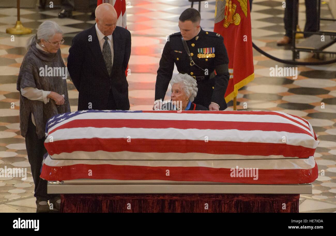 Daughter Lyn Glenn, son David Glenn, and wife Annie Glenn pay their respects to astronaut and former Senator John Glenn in repose at the Ohio Statehouse December 16, 2016 in Columbus, Ohio. The former Marine pilot, Senator and first man to orbit the earth died last week at the age of 95. Stock Photo